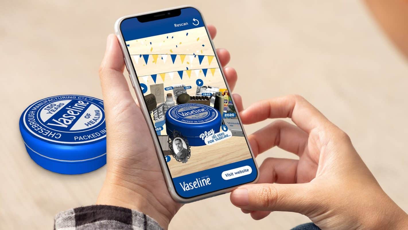 Smartphone scanning a limited edition Vaseline tub with their phone to unveil an AR experience.
